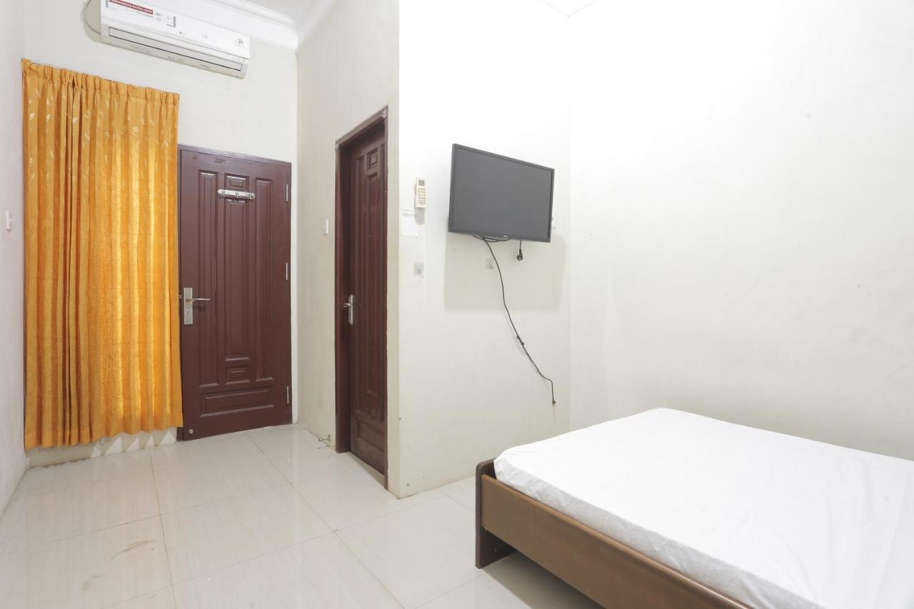 Oyo 93119 Guest House Leo Patra Muara Badak Eksteriør billede