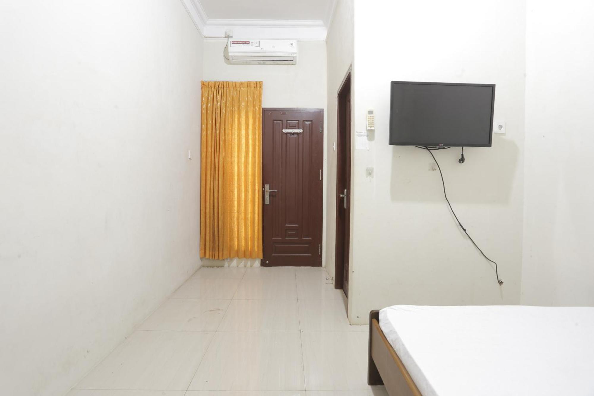 Oyo 93119 Guest House Leo Patra Muara Badak Eksteriør billede
